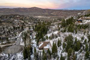 Snowy aerial view with a mountain view