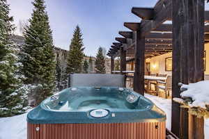 Exterior space featuring a hot tub