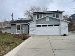 View of front facade with a garage