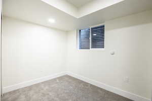 Unfurnished room with carpet floors