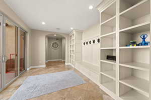 Mudroom featuring tile patterned floors