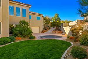 View of yard featuring a garage