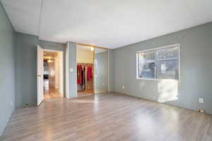 Bedroom with a walk in closet