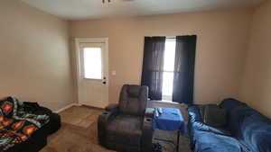 Living room featuring light tile patterned floors