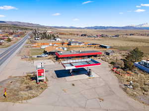 Birds eye view of property with a mountain view