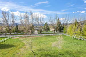 View of yard featuring a mountain view and a rural view