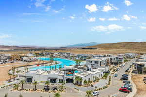 Birds eye view of property with a mountain view