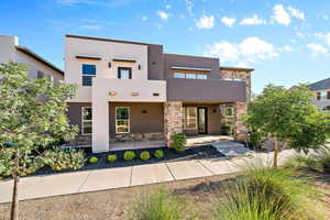 View of front of property featuring a balcony