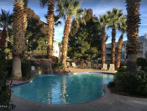 View of Waterfall pool with a patio