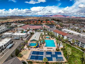 Birds eye view of property with a mountain view