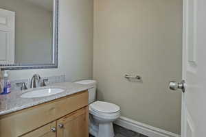 Bathroom with vanity and toilet