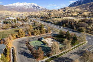 Birds eye view of property with a mountain view