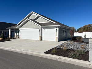 Example Craftsman-style home featuring a garage