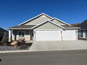 Example Craftsman inspired home with a garage and covered porch