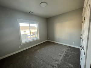 Example View of carpeted spare room