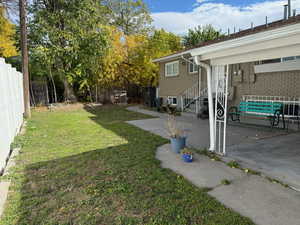 View of yard featuring a patio