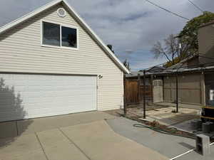 View of home's exterior with a garage