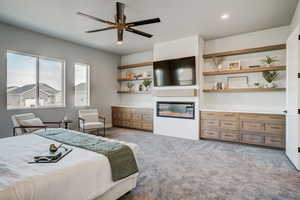 Bedroom with light carpet and ceiling fan