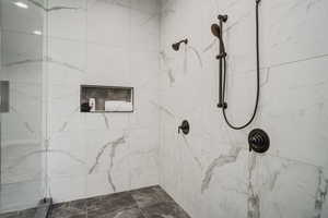 Bathroom with tiled shower