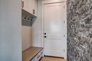 Mudroom featuring light hardwood / wood-style floors