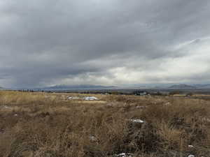 View of local wilderness featuring a mountain view and a rural view