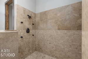 Bathroom with tiled shower