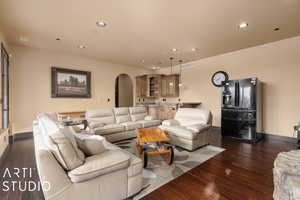 Living room featuring dark hardwood / wood-style flooring