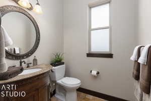 Bathroom with vanity and toilet