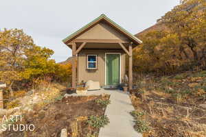 Exterior space with an outbuilding