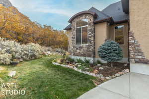 View of home's exterior with a lawn