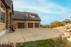 View of home's exterior with a garage