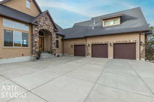 View of front of home featuring a garage