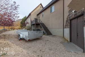 Rear view of house featuring a mountain view