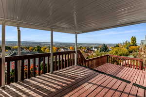 Covered deck off kitchen and family room.