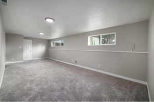 Empty room with carpet floors