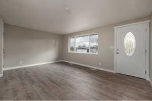 Entryway featuring hardwood / wood-style flooring