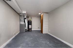 Basement with heating unit and water heater