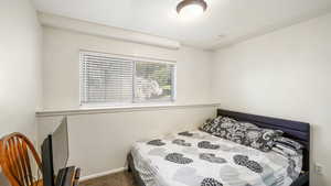 Bedroom with carpet flooring