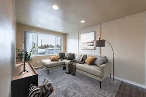 Living room with hardwood / wood-style floors