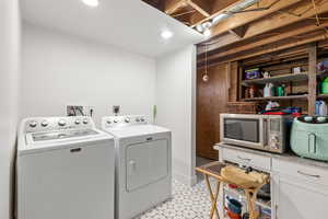 Clothes washing area with washing machine and dryer