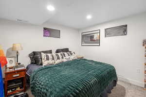 Bedroom featuring carpet floors