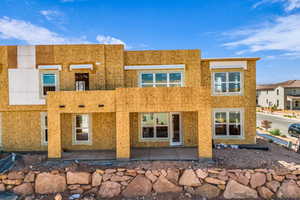 View of front of property featuring a patio