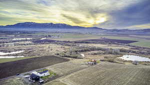 Aerial view at dusk with a rural view and a water and mountain viewSouth East View