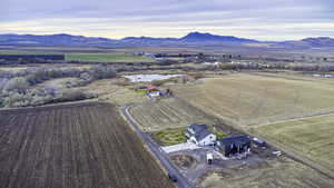 Drone / aerial view featuring a mountain view and a rural view