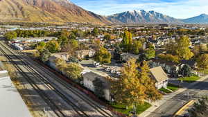 Birds eye view of property featuring a mountain view