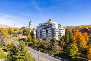 View of building exterior featuring a mountain view