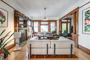 Living room with light wood-type flooring