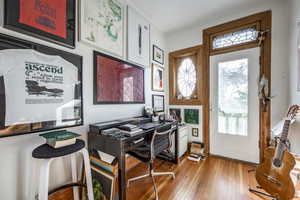 Office area featuring light hardwood / wood-style flooring