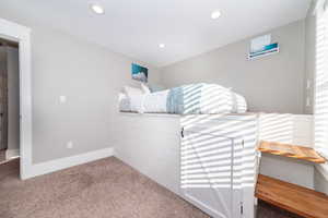 Bedroom featuring carpet floors