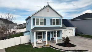 Front facade with a porch and solar panels